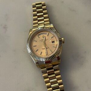 Luxurious Gold Watch with Day-Date Feature